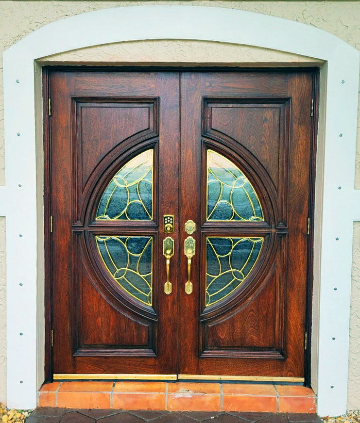 4 panel wood door with glass quarter circle inserts